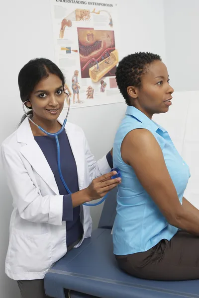 Female Doctor Doing A Medical Examination
